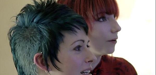  Inked transgirl straponfucked by redhead babe